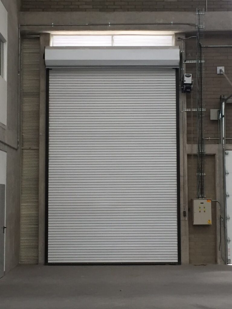 Garage door opener and rail assembly installed overhead